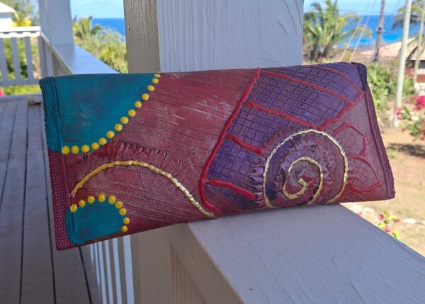Teri Monique's Lulu clutch purse can be toned down or paired to add a burst of color.